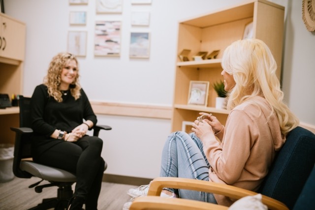 Medical professional talking with patient