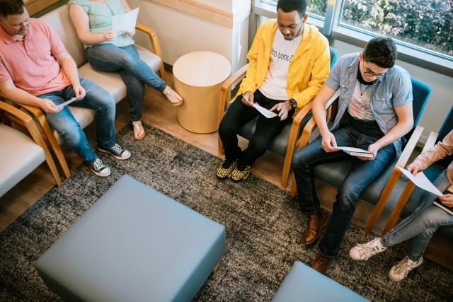 Patients talking in a group session in treatment