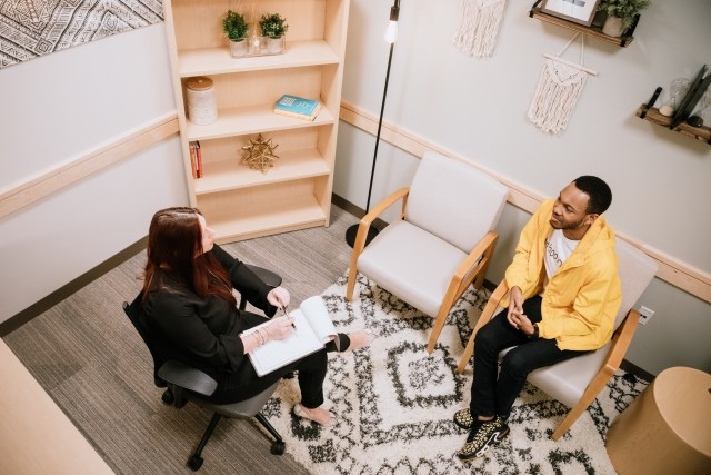 A patient and a clinician in a treatment session