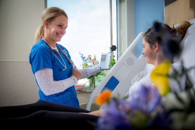 A patient in her room in the ACUTE treatment program