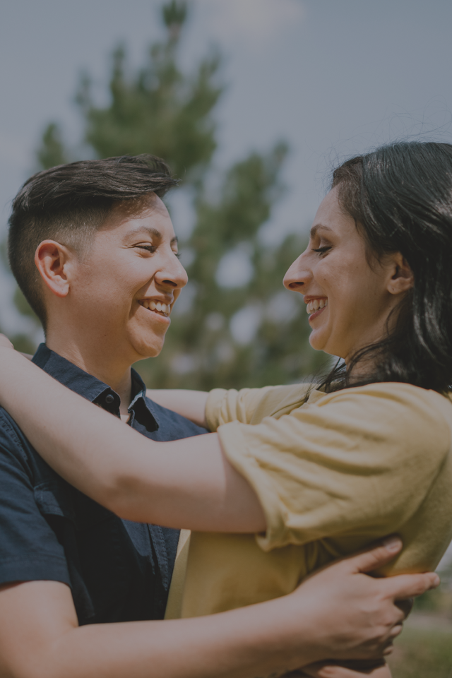 A female couple outdoors smiling
