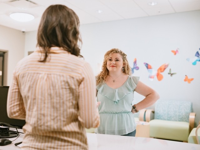A woman checks into treatment