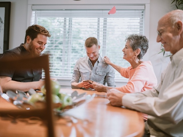 A family playing cards
