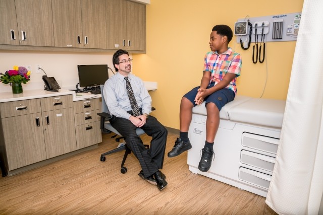 A patient works with his physician in treatment