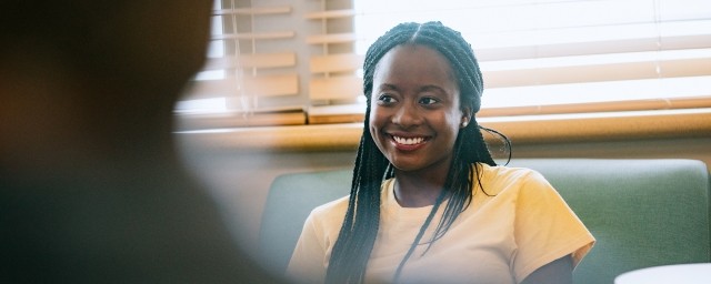 A woman participates in a group session