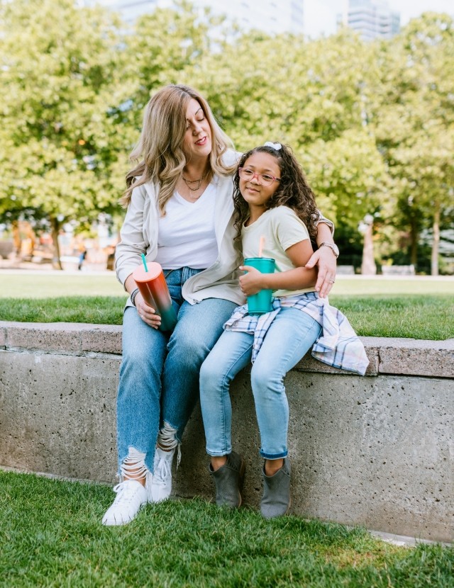 A mother is sitting with her daughter