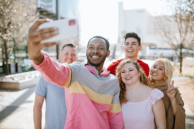 A group of people taking a photo together