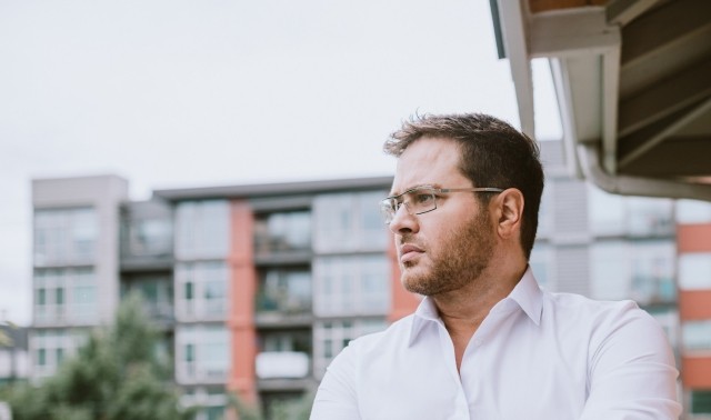 man on balcony