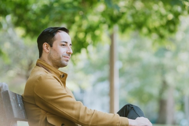 sitting in park on bench