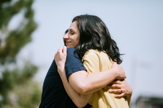 woman hugging