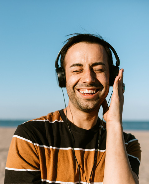 Eric Dorsa listening to music at the beach